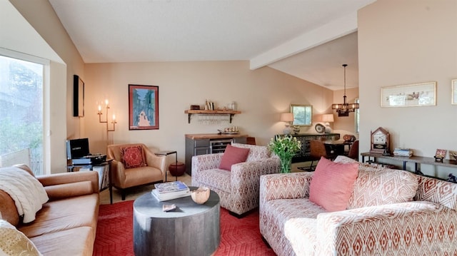 living room with a notable chandelier, vaulted ceiling with beams, and carpet