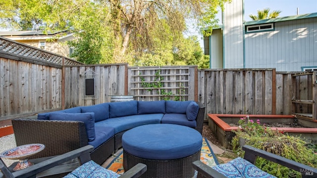 deck featuring an outdoor hangout area and a fenced backyard
