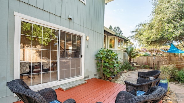 wooden deck featuring fence