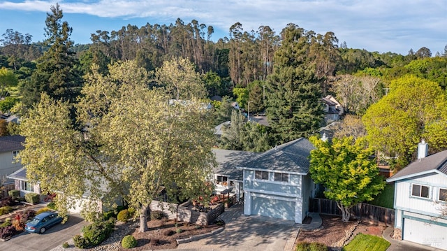 aerial view featuring a forest view