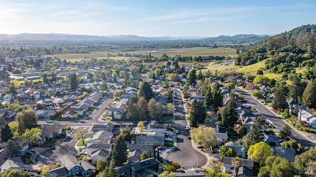 bird's eye view with a mountain view and a residential view