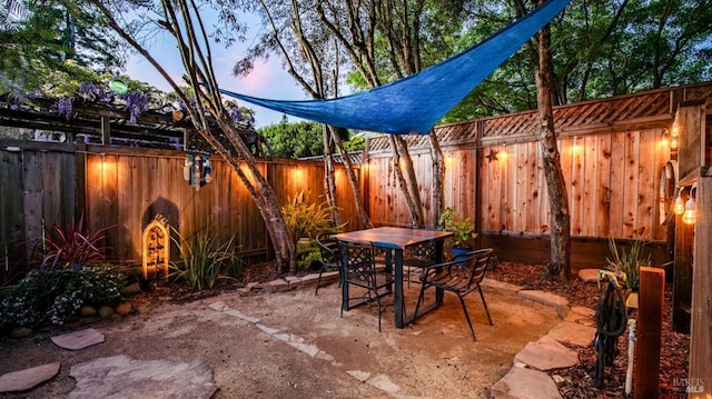 view of patio / terrace with a fenced backyard and outdoor dining space