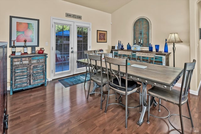 dining room with french doors, baseboards, and wood finished floors