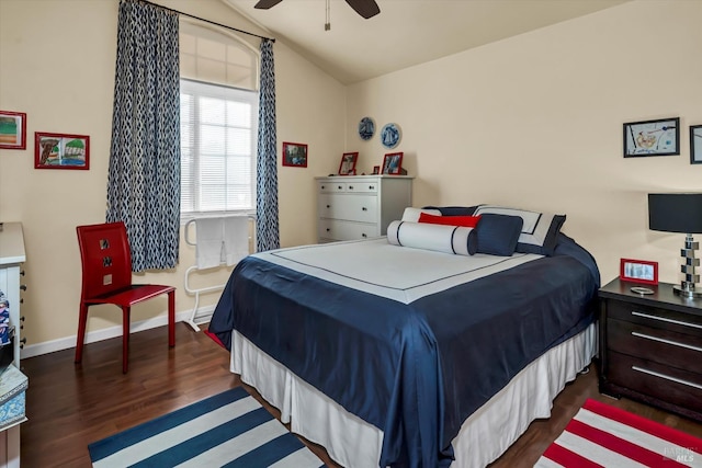 bedroom with a ceiling fan, lofted ceiling, baseboards, and dark wood-style flooring