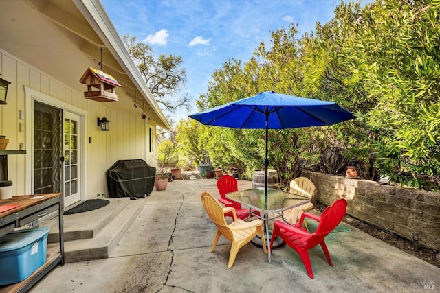 view of patio featuring outdoor dining space and area for grilling