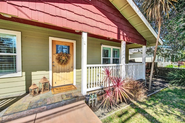 entrance to property with covered porch