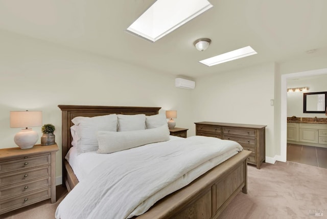 bedroom with light carpet, a skylight, a wall mounted AC, and a sink