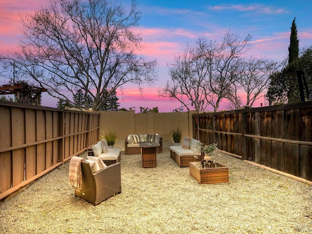 view of patio featuring a fenced backyard and outdoor lounge area