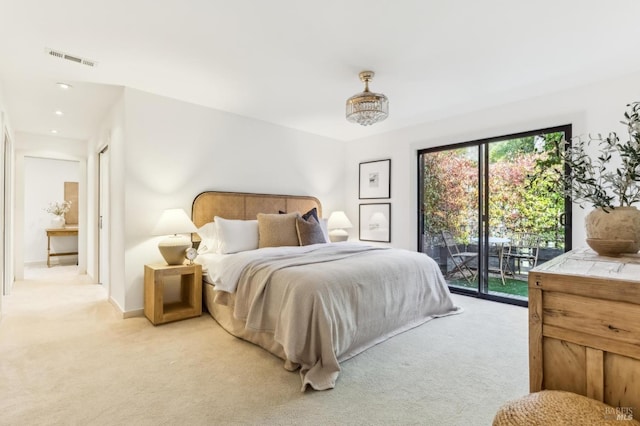 bedroom with recessed lighting, visible vents, light carpet, and access to exterior