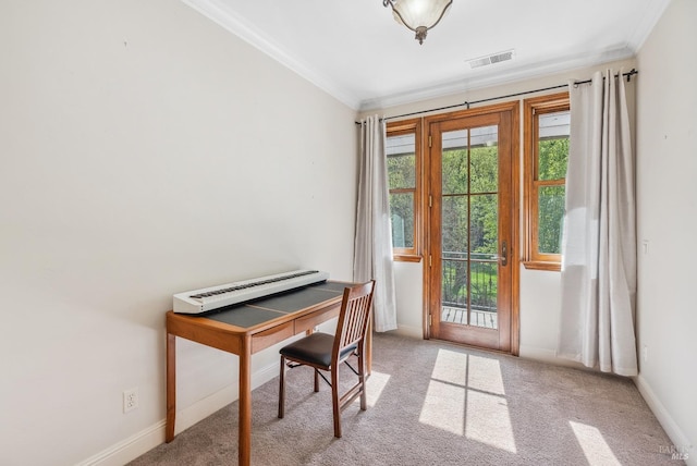 carpeted office featuring baseboards, a healthy amount of sunlight, visible vents, and ornamental molding