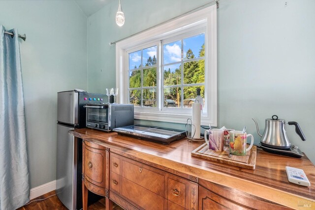 office featuring a toaster and baseboards