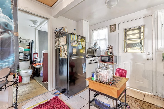 interior space with light tile patterned floors
