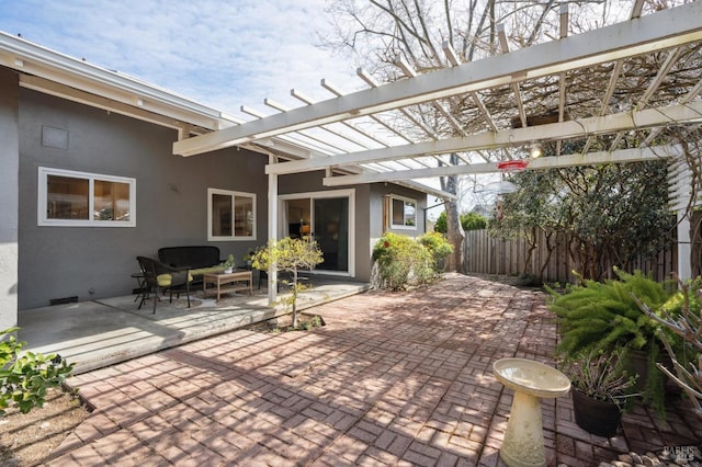 view of patio / terrace with outdoor lounge area, fence, and a pergola