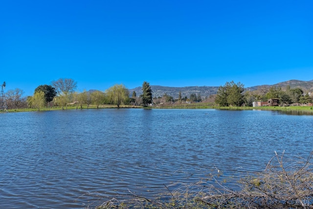 property view of water featuring a mountain view