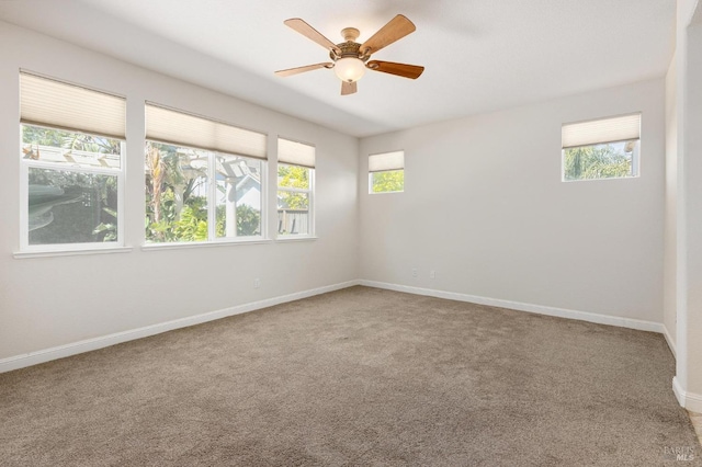2550 Duncan St, Dixon, CA 95620 - carpeted spare room with a ceiling fan and baseboards