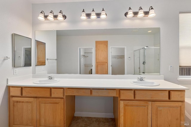 2550 Duncan St, Dixon, CA 95620 - full bath featuring a stall shower, a spacious closet, double vanity, and tile patterned flooring