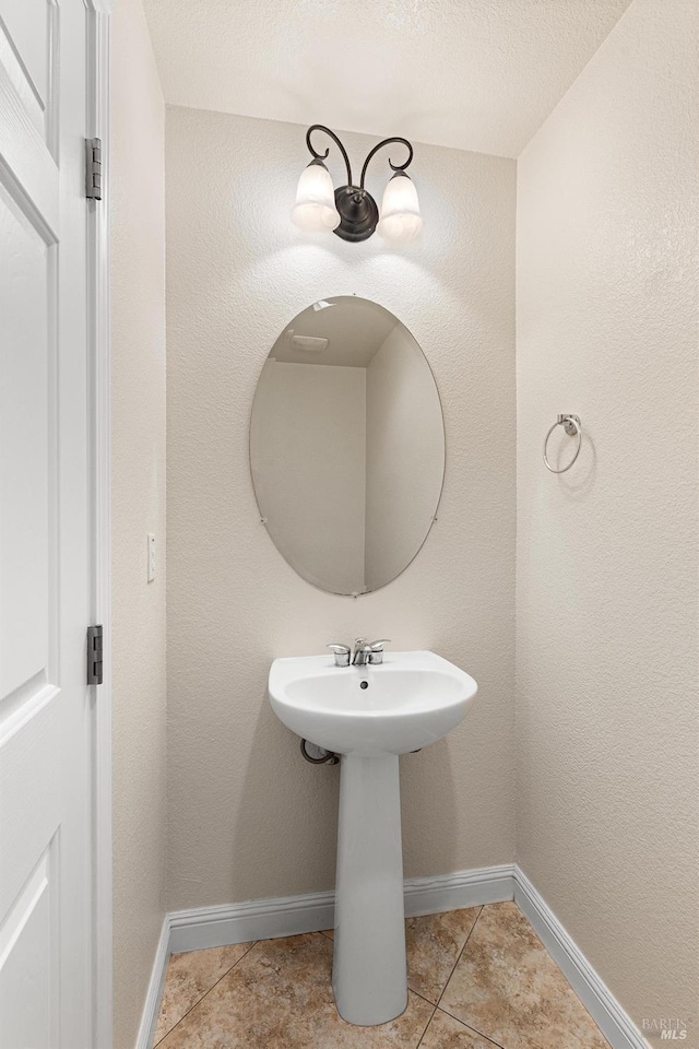 2550 Duncan St, Dixon, CA 95620 - bathroom with tile patterned floors and baseboards