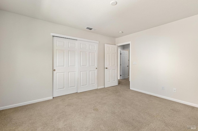2550 Duncan St, Dixon, CA 95620 - unfurnished bedroom with carpet flooring, baseboards, and a closet