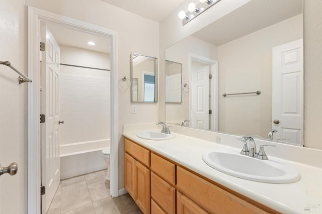 2550 Duncan St, Dixon, CA 95620 - bathroom featuring toilet, double vanity, tile patterned floors, and bathtub / shower combination