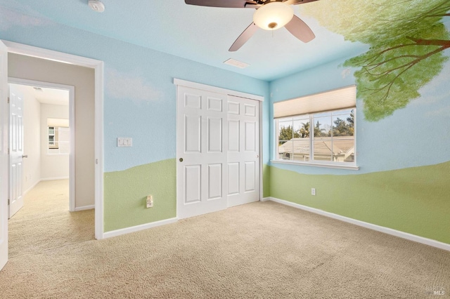 2550 Duncan St, Dixon, CA 95620 - unfurnished bedroom with carpet flooring, a closet, baseboards, and ceiling fan