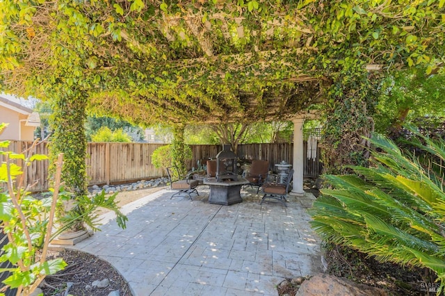 2550 Duncan St, Dixon, CA 95620 - fenced backyard with a fire pit and a patio area