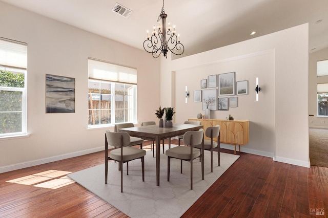 2550 Duncan St, Dixon, CA 95620 - dining area with a chandelier, hardwood / wood-style flooring, plenty of natural light, and baseboards