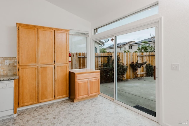 entryway featuring lofted ceiling