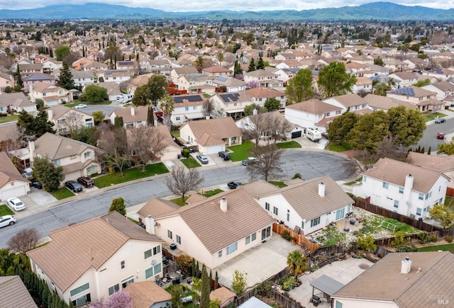 bird's eye view with a mountain view and a residential view