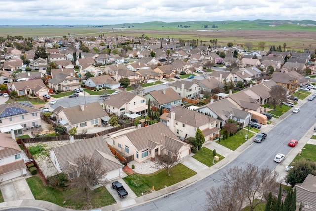 aerial view with a mountain view and a residential view