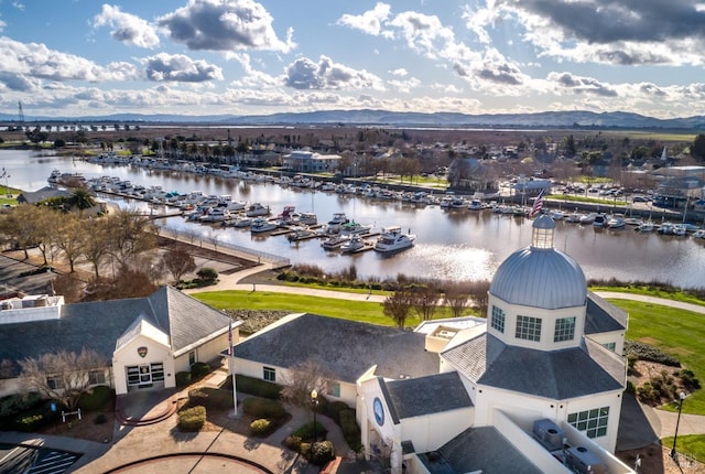 bird's eye view featuring a water and mountain view