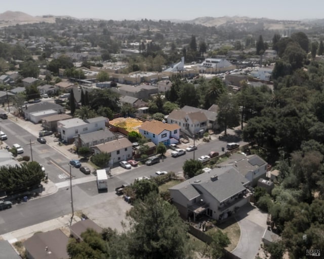 birds eye view of property with a residential view