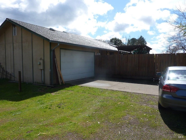 garage with fence