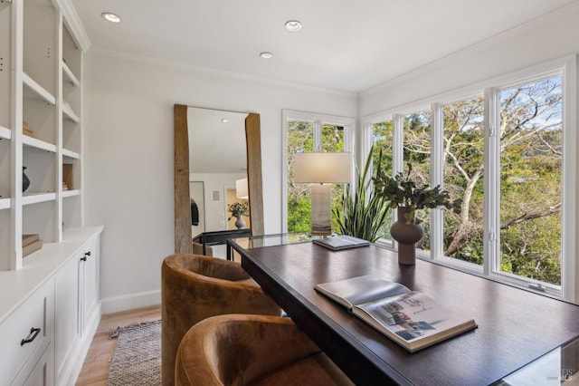 home office featuring recessed lighting, light wood-style floors, baseboards, and ornamental molding