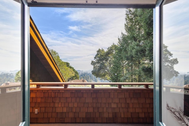 unfurnished sunroom featuring a wealth of natural light