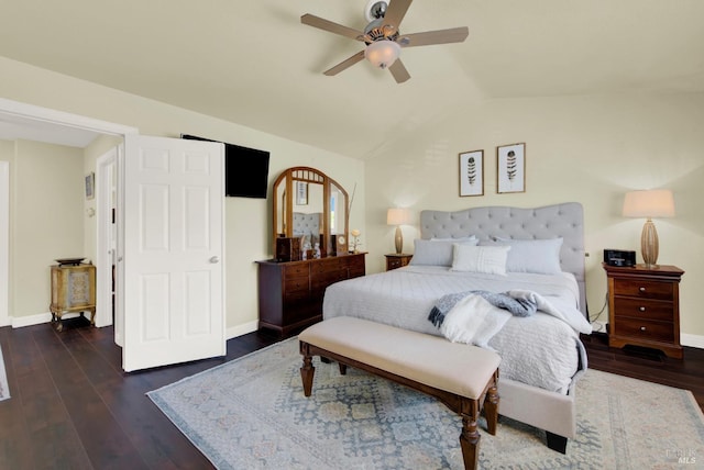 bedroom with baseboards, lofted ceiling, dark wood finished floors, and a ceiling fan