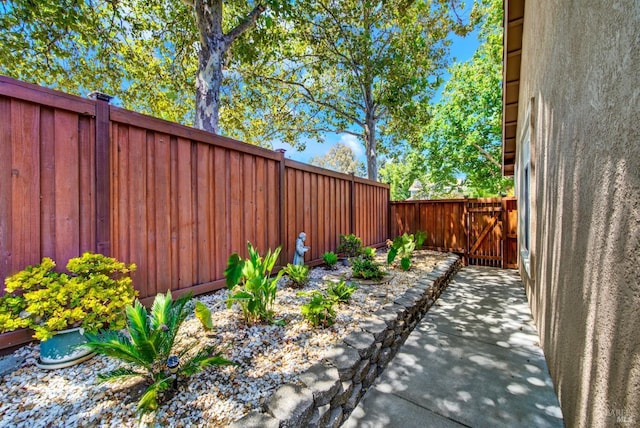 view of patio / terrace with a gate and a fenced backyard