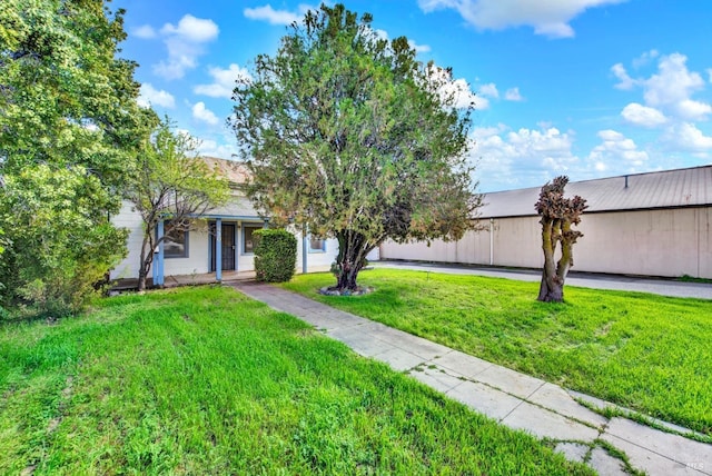 view of front of home with a front yard