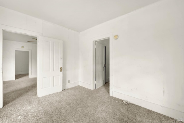 empty room with carpet flooring