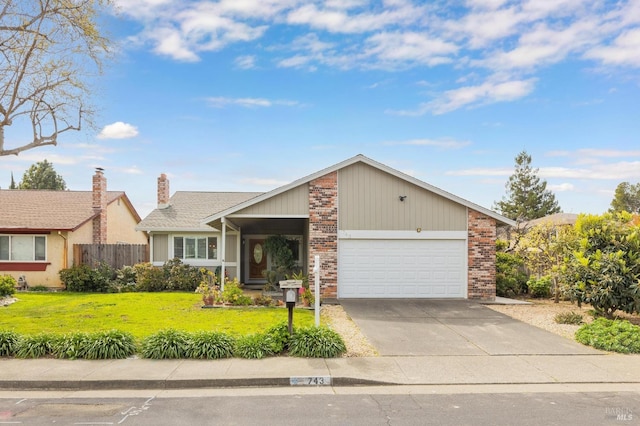 ranch-style home with a chimney, fence, a front lawn, an attached garage, and driveway