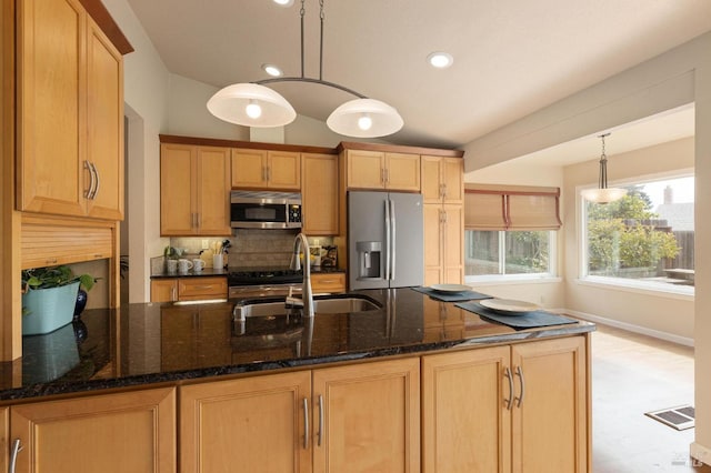 kitchen with a sink, tasteful backsplash, visible vents, recessed lighting, and appliances with stainless steel finishes