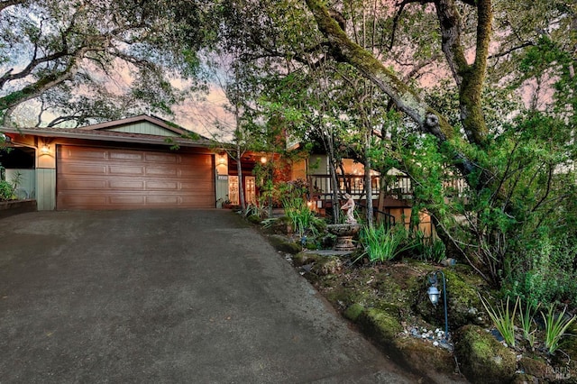 view of front of house featuring driveway and an attached garage