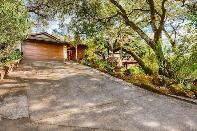 view of front of house featuring a garage and driveway