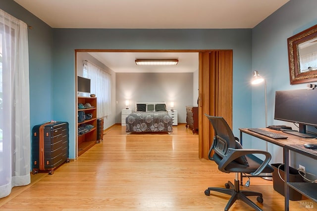 bedroom with light wood-style floors