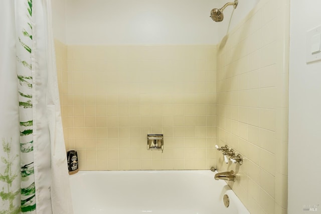 full bathroom featuring shower / tub combo with curtain