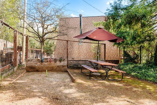 view of patio / terrace with fence