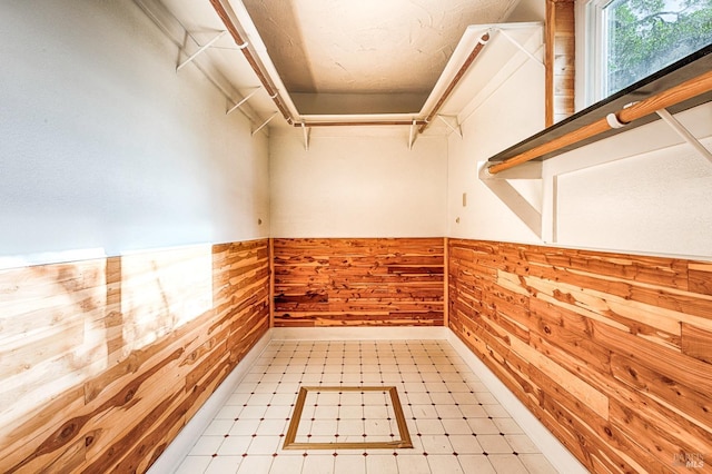 walk in closet featuring tile patterned floors