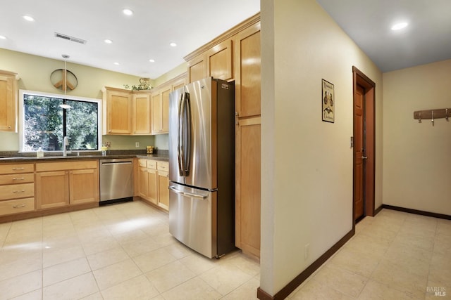 kitchen with visible vents, light brown cabinets, recessed lighting, stainless steel appliances, and a sink