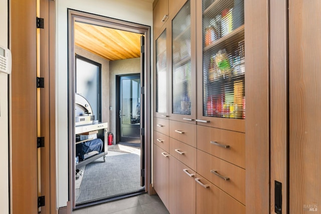 interior space with light tile patterned floors