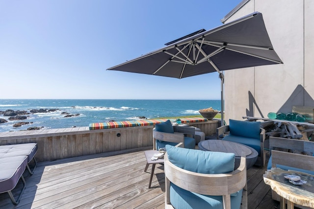 wooden terrace with a water view