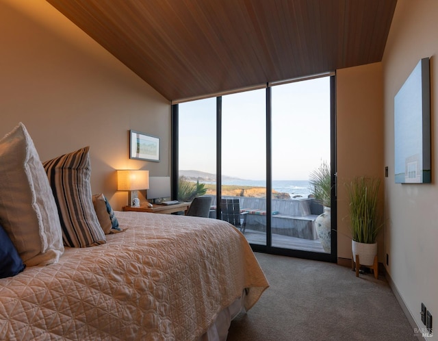 carpeted bedroom with wooden ceiling, baseboards, access to exterior, and expansive windows